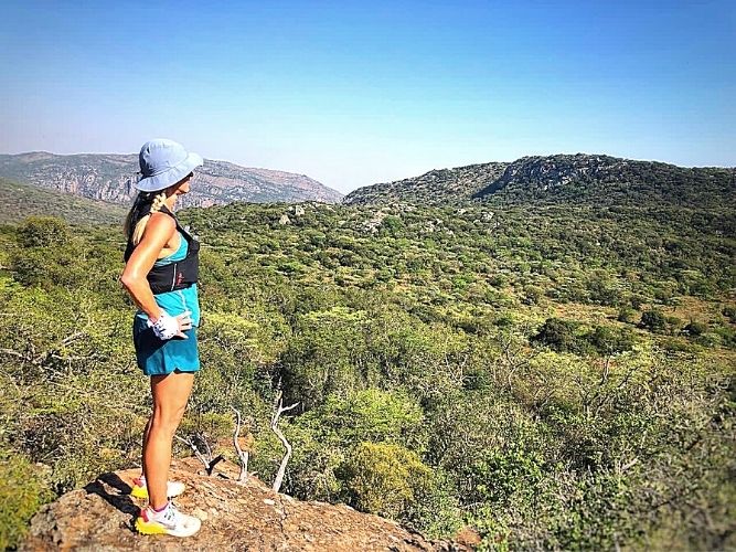 Woman enjoying the view looking out over the Soutpansberg Mountains South Africa